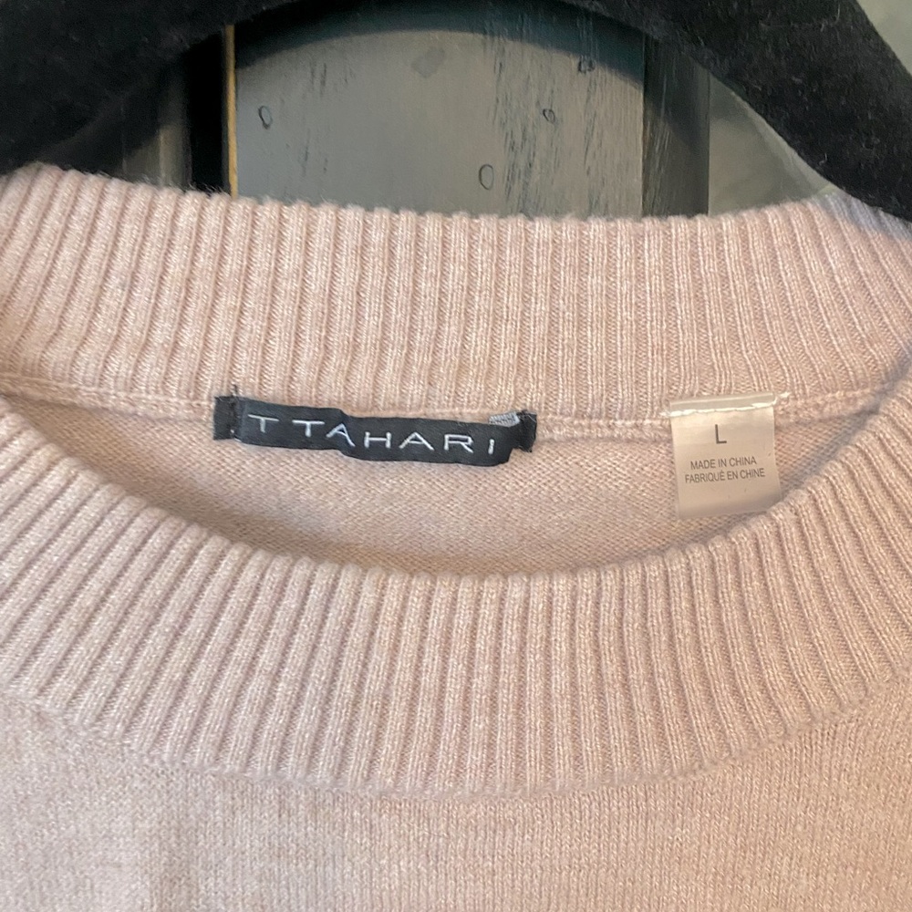 Pink sweater, size L. Worn once. White polka dots.